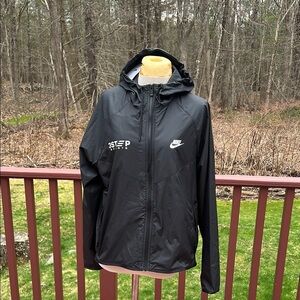 New! Nike large black zippered rain jacket .